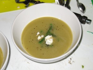 Asparagus soup, with some asparagus tips and feta cheese.